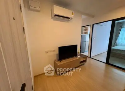 Modern apartment interior with air conditioning and sleek wooden flooring