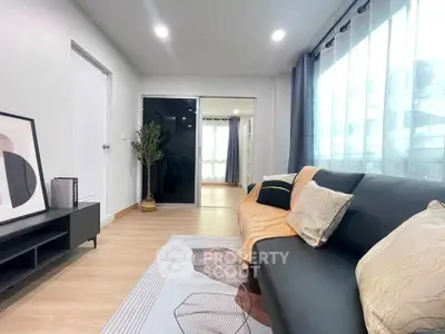 Modern living room with stylish decor and cozy seating area