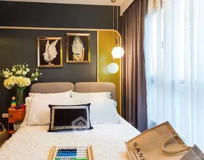 Luxurious bedroom with elegant decor and large window for natural light