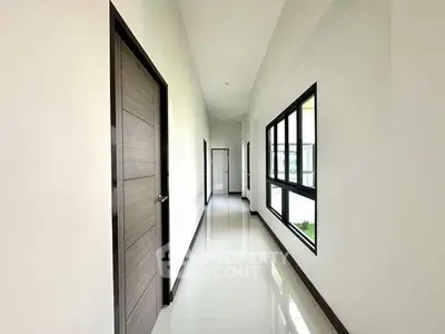 Spacious modern hallway with sleek design and natural light