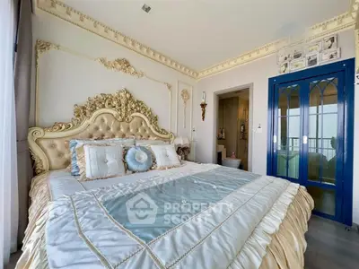 Luxurious bedroom with ornate decor and elegant bedding in a high-end property.