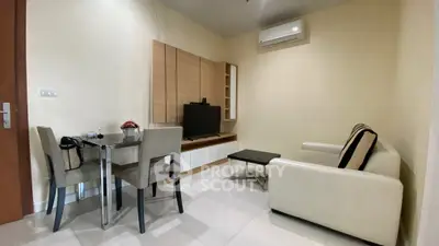 Modern living room with sleek furniture and air conditioning