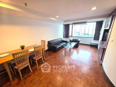 Spacious living room with wooden flooring and modern furniture