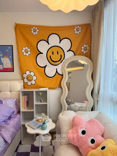 Charming bedroom with playful decor, featuring a cozy bed, unique mirror, and vibrant wall art.