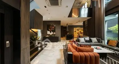 Luxurious modern living room with high ceilings and elegant decor