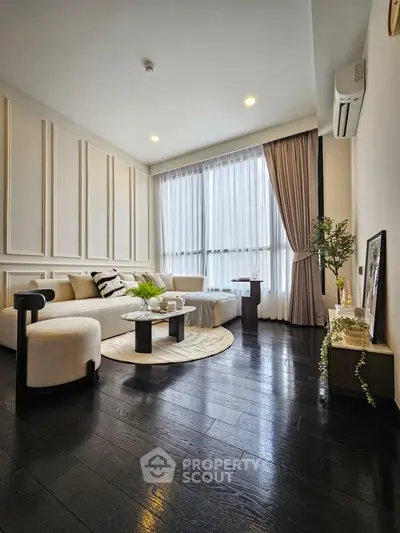 Elegant living room with modern decor and natural light