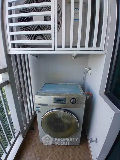 Compact balcony with washing machine and air conditioning unit