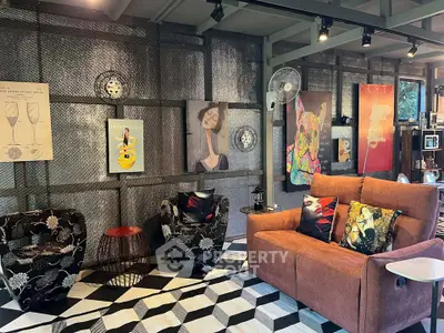 Stylish living room with modern art and cozy seating area