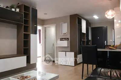 Modern living room with sleek furniture and open layout, perfect for contemporary living.