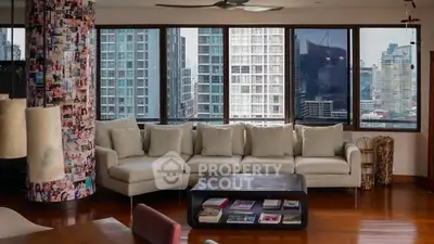 Spacious living room with panoramic city view and stylish decor