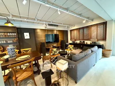 Spacious modern living room with stylish furniture and open layout, perfect for entertaining.