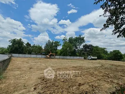 Spacious land plot with clear skies, ideal for development opportunities.