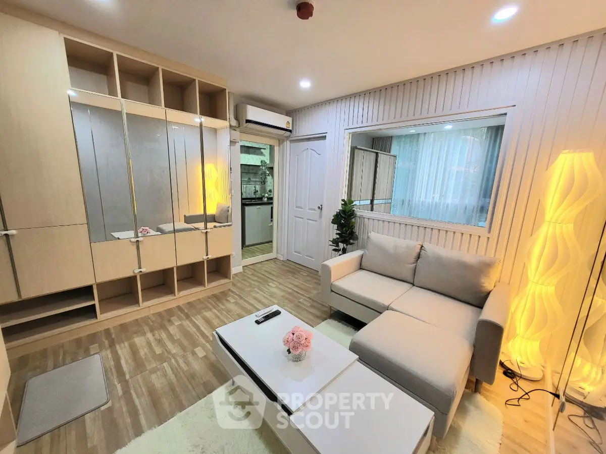 Modern living room with cozy sofa and stylish decor