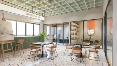 Modern workshop space with stylish seating and large windows