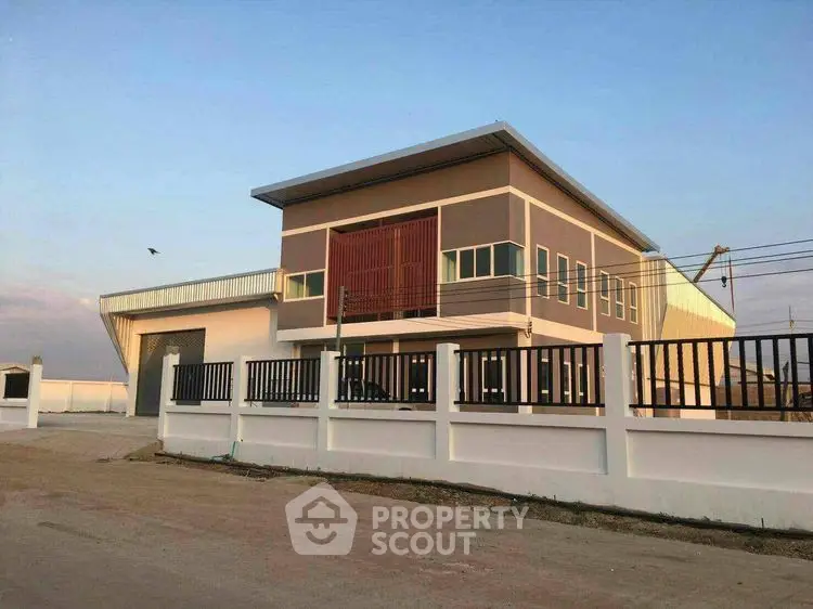 Modern industrial-style building with spacious exterior and sleek design