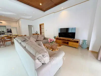 Spacious modern living room with elegant decor and large sectional sofa