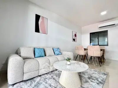 Modern living room with stylish decor and cozy seating area