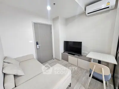 Modern living room with sleek furniture and air conditioning in a cozy apartment.