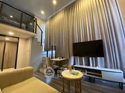 Modern loft-style living room with high ceilings and elegant decor