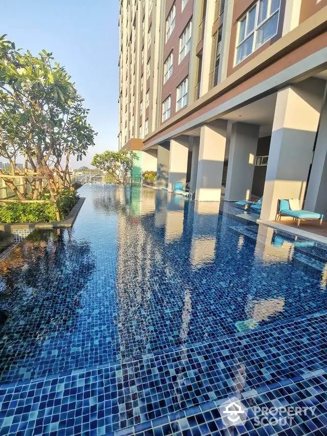 Luxurious condominium with stunning poolside view and modern architecture