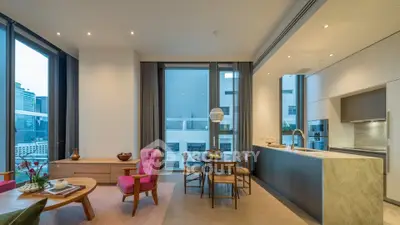 Luxurious modern living room with open kitchen and city view, featuring elegant furniture and ambient lighting.