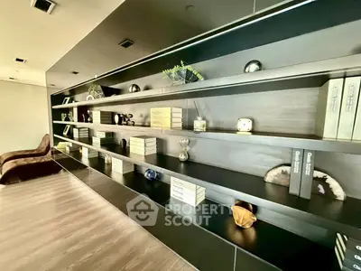 Luxurious modern living room with elegant built-in shelving and stylish decor accents.