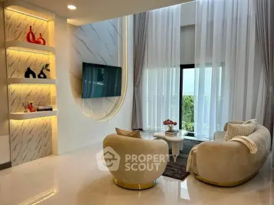 Luxurious modern living room with elegant decor and floor-to-ceiling windows