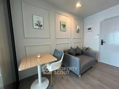 Modern living room with stylish decor and cozy seating area, perfect for relaxation and entertaining.