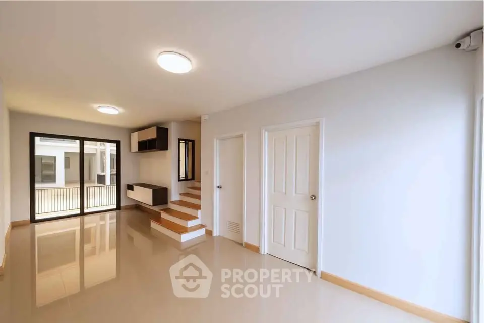 Spacious modern living room with sleek design and natural light