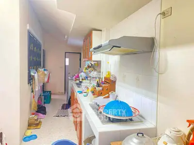 Cozy kitchen with closed layout and modern appliances