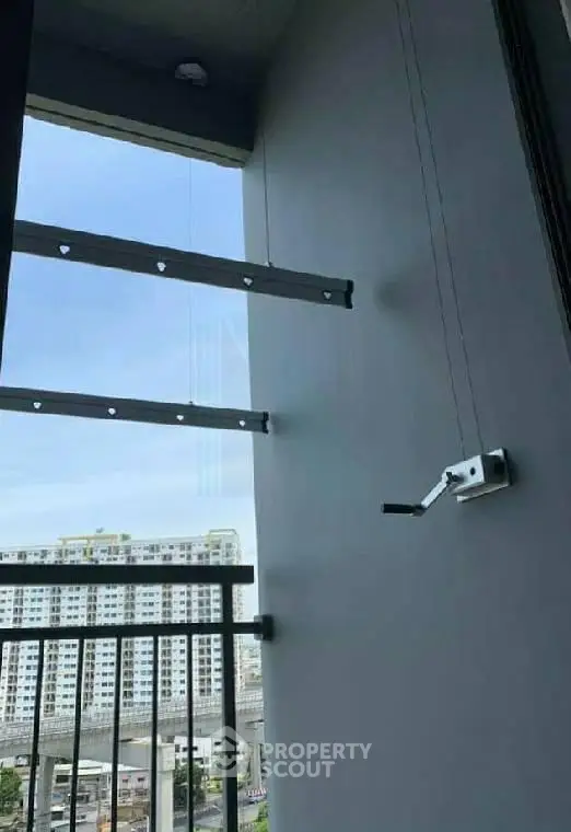 Modern balcony with city view and sleek railing design