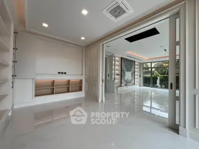 Luxurious modern living room with sleek design and large windows