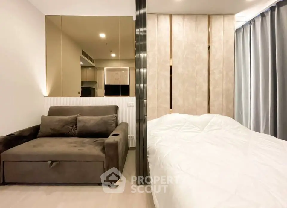 Modern studio apartment with stylish decor and cozy furnishings