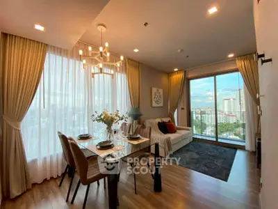 Luxurious living room with panoramic city view and elegant dining area