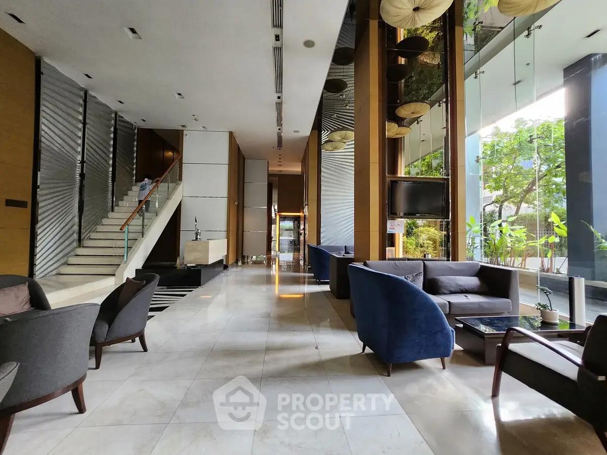 Luxurious modern lobby with elegant seating and natural light