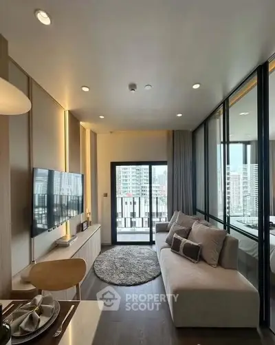 Modern living room with sleek design and city view, featuring a cozy sofa and wall-mounted TV.