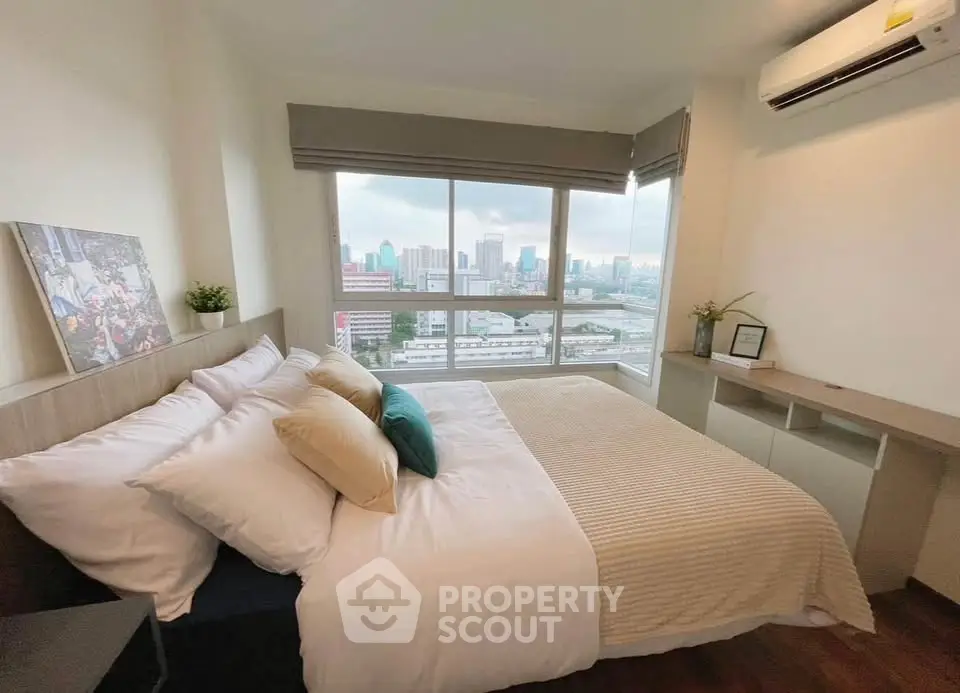 Cozy bedroom with city view and modern decor