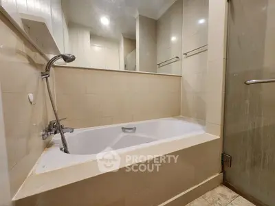 Luxurious bathroom with elegant bathtub and modern fixtures