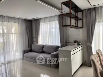 Elegant living room with modern sofa and natural light
