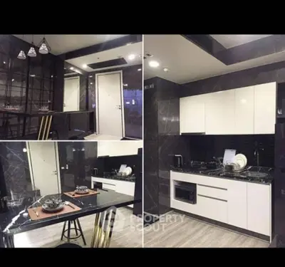 Modern kitchen with sleek black and white design, featuring an open layout and stylish dining area.