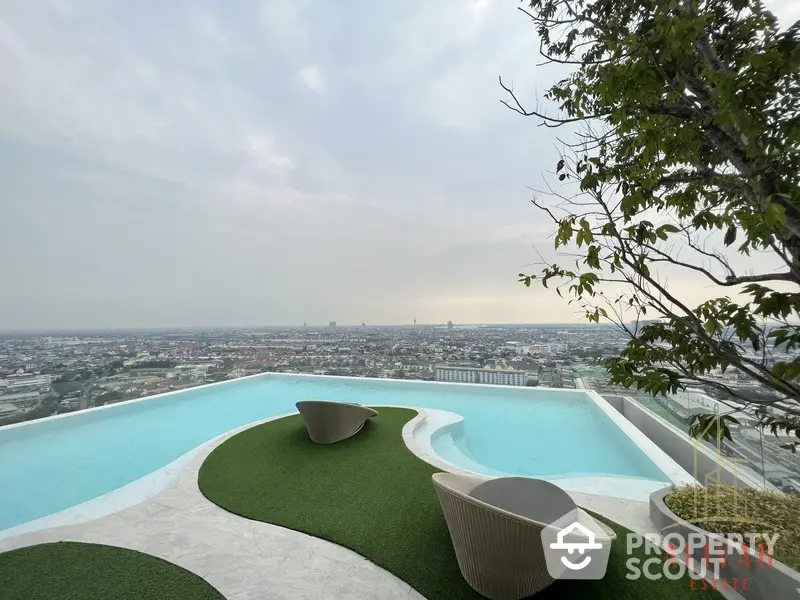 Luxurious rooftop infinity pool with panoramic city views, modern loungers, and lush greenery, perfect for upscale urban living.