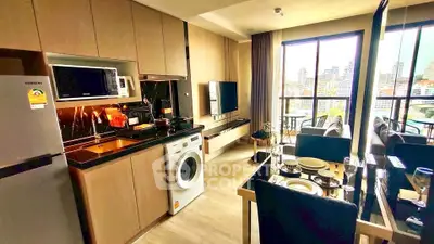 Modern open-layout kitchen and living room with city view in luxury apartment
