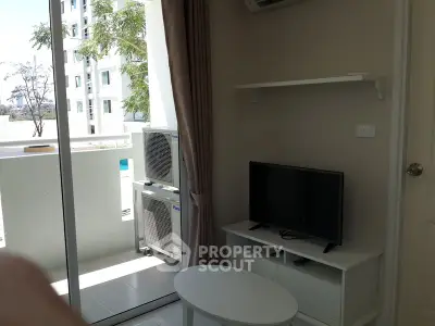 Modern living room with balcony view in a stylish apartment