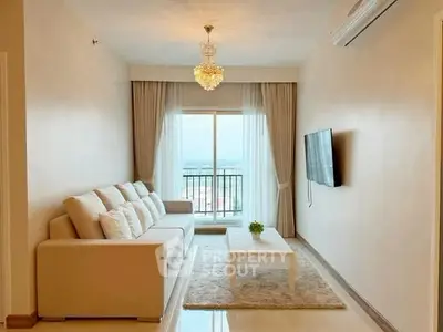 Elegant living room with modern decor and large window offering stunning views.