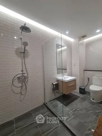 Modern bathroom with sleek shower and contemporary fixtures