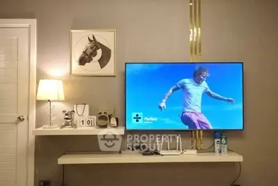 Stylish living room with modern decor and wall-mounted TV
