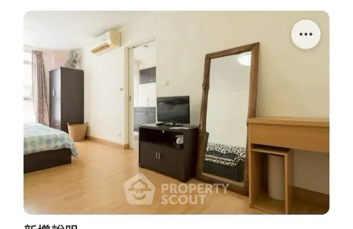 Spacious bedroom with modern decor and natural light