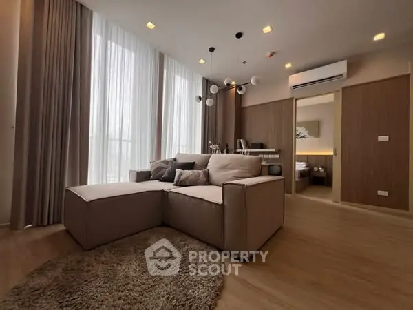 Luxurious modern living room with plush sofa and elegant lighting