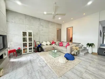 Spacious modern living room with stylish decor and natural light
