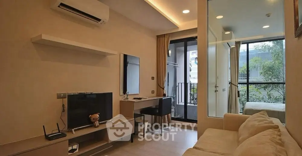 Modern living room with cozy sofa and balcony view in urban apartment